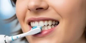 how to floss or brush your teeth